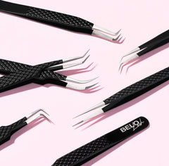 Black lash tweezers by Belo Lash on a pink background, designed for precise and professional lash application.
